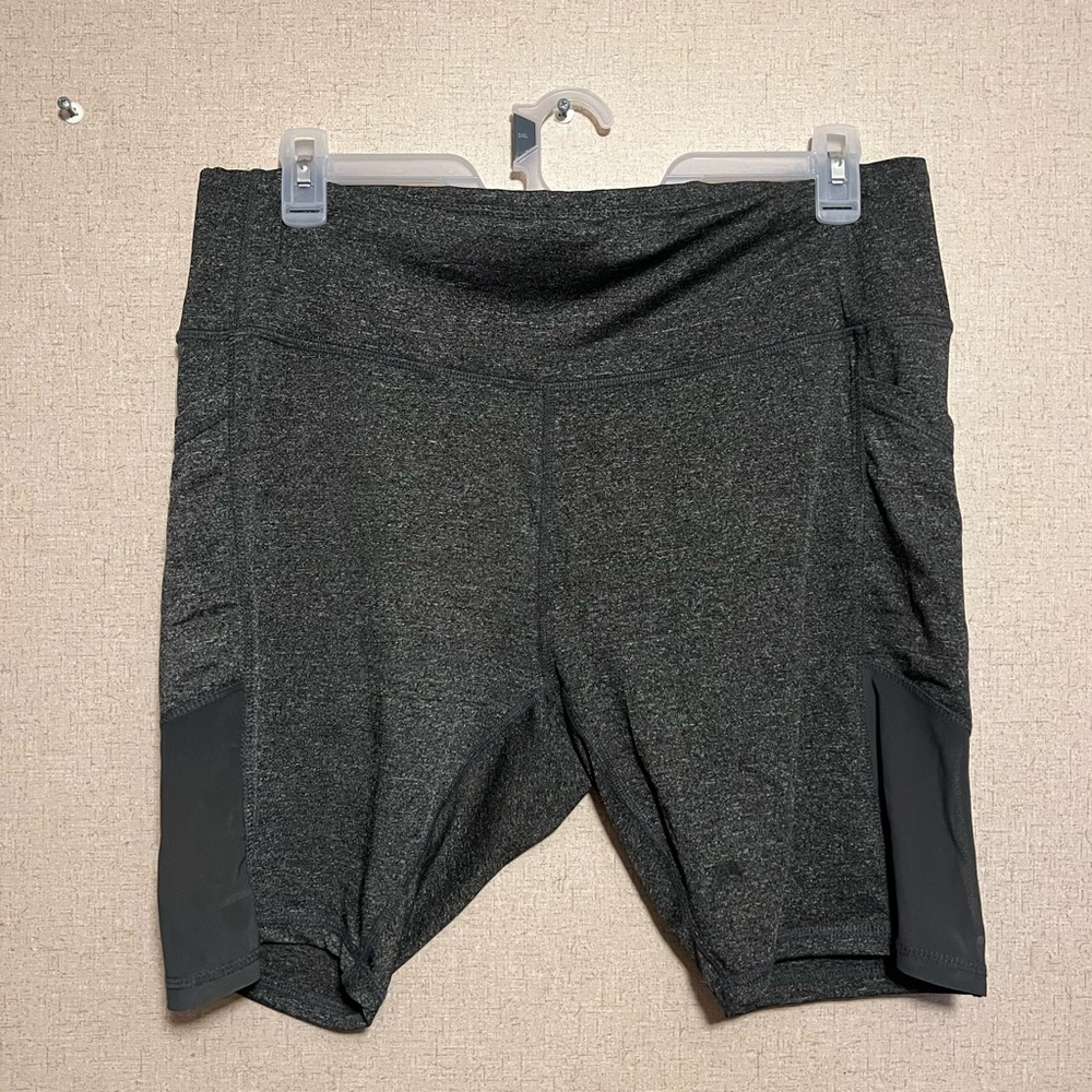 Grey mesh biker shorts.
